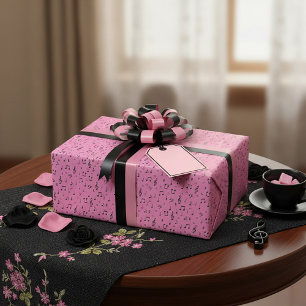 Rosa und schwarzes Musik-Wrap-Papier Geschenkpapier