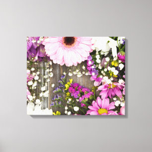 Rosa und violette Blumen auf Holz Leinwanddruck