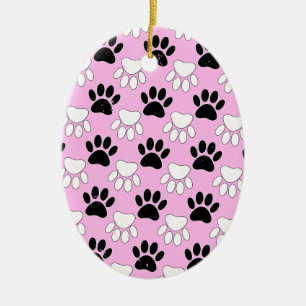 Rosa Untergrund: erschütterte schwarz-weiße Paws Keramikornament