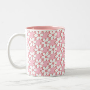 Rosa-weißes Blumenmuster auf hellrosa Zweifarbige Tasse