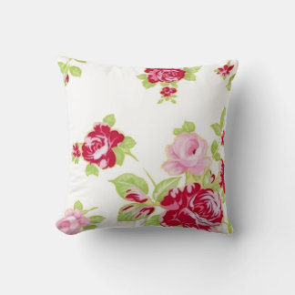 Rose auf weißem Kissen