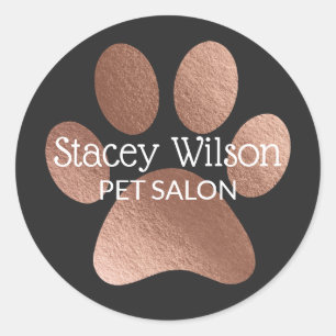 Rose-Gold-Paw-Print-Logo auf dem Kohleproduktetike Runder Aufkleber