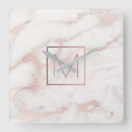 Rose Goldmonogramm auf rosa Marmorstein Quadratische Wanduhr