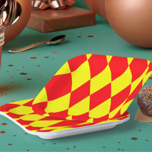 Rot-gelbes Harlekin-Karodesign Pappteller