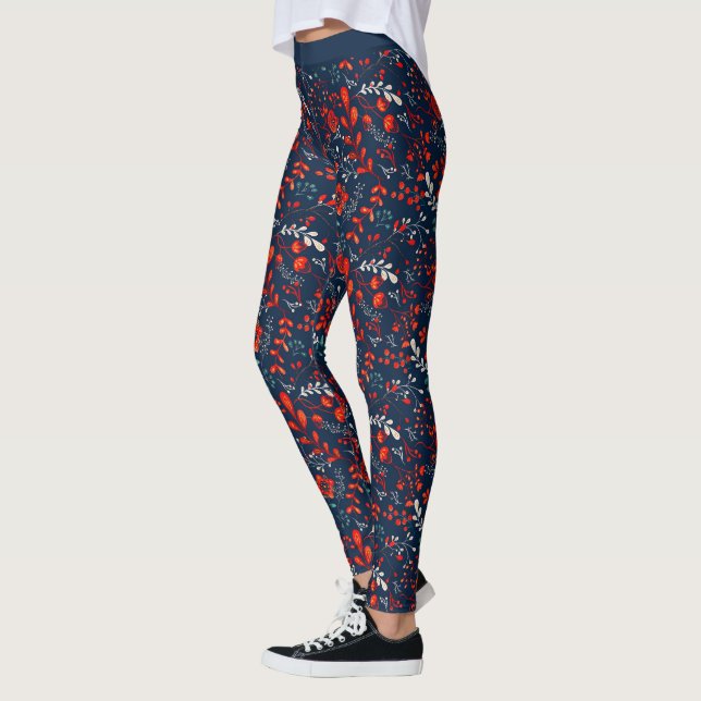 Rot-weiße Weihnachten-Blume auf dunkelblauen Leggi Leggings (Links)