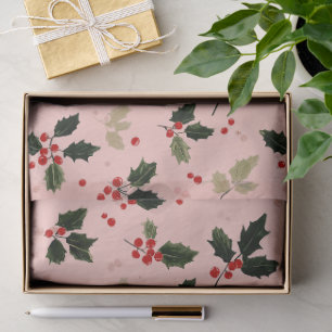 Rote Beeren und Stechpalme auf Rosa Seidenpapier