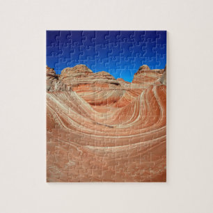 Rote, beige und gelbe Streifen im Wind und Puzzle