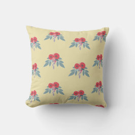 Rote Blume und grüne Blätter auf braun Kissen