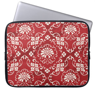 Rote chinesische Spiralen-Blumen Hintergrund. Laptopschutzhülle