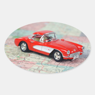 Rote Corvette auf Straßenkarte Ovaler Aufkleber