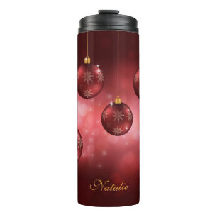 Rote festliche Weihnachtsbaumkugeln mit individuel Thermosbecher