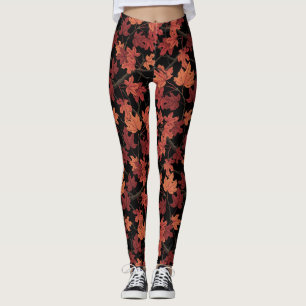 Rote Herbst-Ahornblätter auf Schwarz Leggings