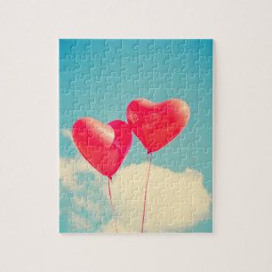 Rote Herzballons gegen bewölkten Himmel Puzzle