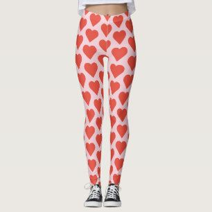 Rote Herzen auf rosa Leggings