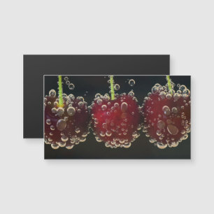 Rote Kirschen im Wasser Magnetkarte
