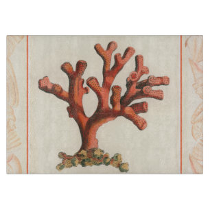 Rote Koralle mit Tritonshorn-Muschel-Grenze Schneidebrett