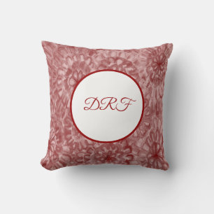 Rote oder farblich gestrichene Blume mit Monogramm Kissen