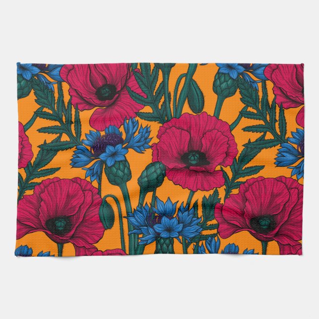 Rote Pfeffer und blaue Kornblumen auf Orange Geschirrtuch (Horizontal)