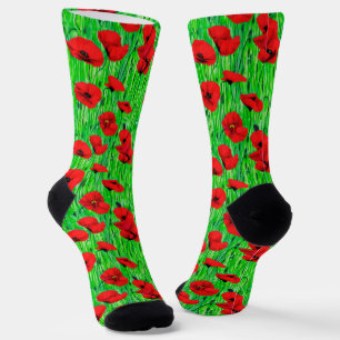 Rote Pflücke in einem grünen Feld Socken