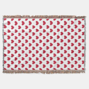 Rote Polka-Herzen auf weiß Decke