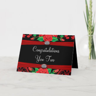 Rote Rebe-Rosen auf schwarzen Glückwünschen Karte