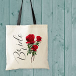 Rote Rose Wedding Brides Bag Tragetasche<br><div class="desc">Tuchbeutel für die Braut. Realistische rote Rosen mit "Bride"-Text in dunkelgrauem Schriftzeichen. Ein modernes Geschenk oder ein nützlicher Gegenstand für die Braut,  die Rose Lieben.</div>