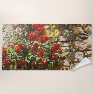 Rote Rosen gegen eine Steinmauer Strandtuch