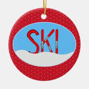 Rote Skier und Schnee in einem Oval Keramik Ornament