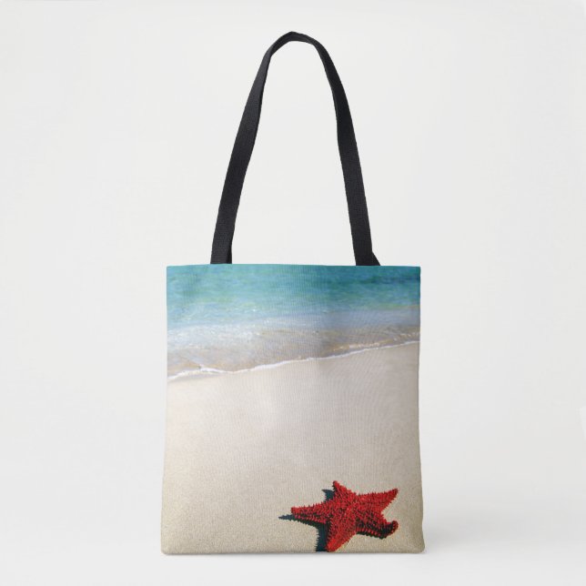 Rote Starfish auf weißem Sand-Strand (Vorderseite)