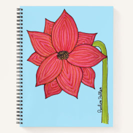 Rote Sternblume mit blauem Hintergrund Notizbuch