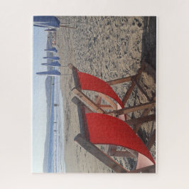 Rote Stühle am Sandstrand Puzzle