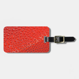 Rote Tropfen auf Glas Gepäckanhänger