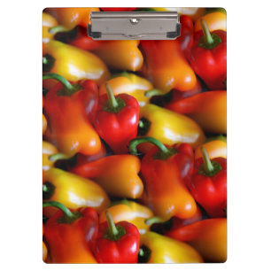 Rote und gelbe Paprikaschoten Klemmbrett