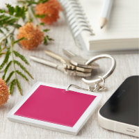 Rote und rosa Blume mit üppig grünem l