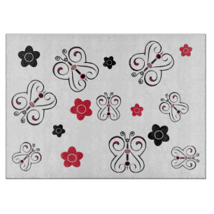 Rote und schwarze Schmetterlinge und Positions Schneidebrett