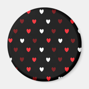 Rote und weiße Herzen auf schwarz Magnet