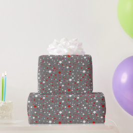 Rote und weiße Sterne auf grauem Umschlagpapier Geschenkpapier