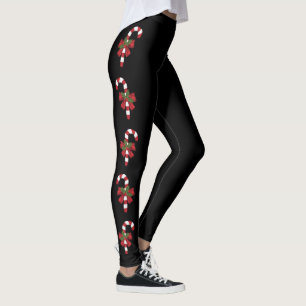 Rote und weiße Weihnachtszuckerrohre auf Schwarz Leggings