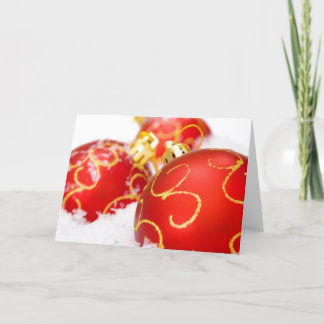 Rote Weihnachtsbaum-Verzierungen Feiertagskarte