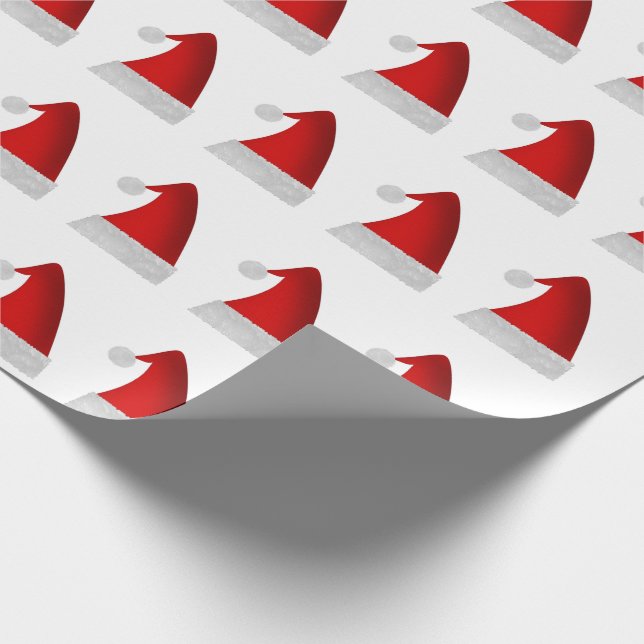 Rote WeihnachtsWeihnachtsmannmützen Geschenkpapier (Ecke)