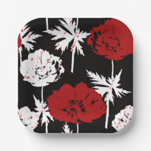 Rote, weiße Blume auf schwarz. Pappteller