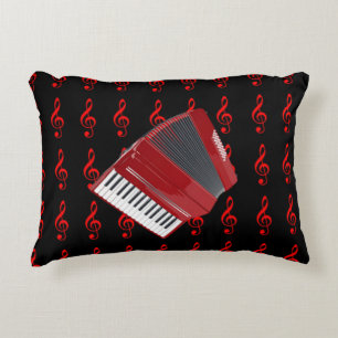 Roter Accordion, roter Treppenschuss auf schwarzem Zierkissen