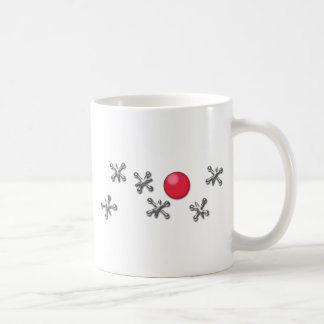 Roter Gummiball und Jacke Tasse