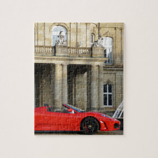 Roter italien ischer Sportwagen vor Schloss Puzzle