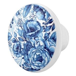 Roter Knopf mit blauer und weißer Blume, gerundete Keramikknauf