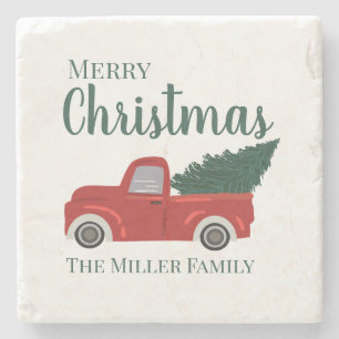 Roter LKW mit Weihnachtsbaum-Familienname Steinuntersetzer