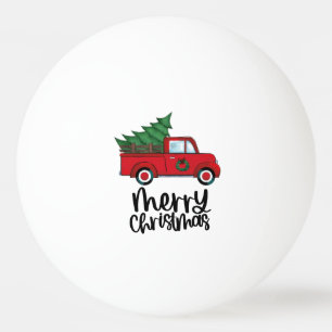 Roter LKW mit Weihnachtsbaum für Pingpongspieler Tischtennisball