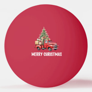 Roter LKW mit Weihnachtsbaum für Pingpongspieler Tischtennisball
