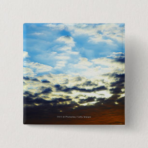 Roter orange blauer Sonnenuntergang mit Wolken Button
