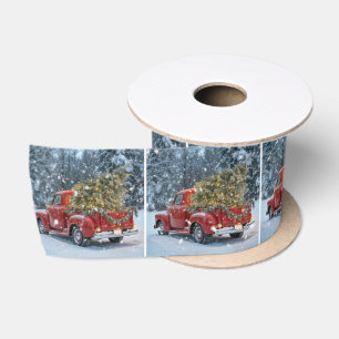 Roter Retro-LKW mit Weihnachtsbaum in Schneeflocke Satinband